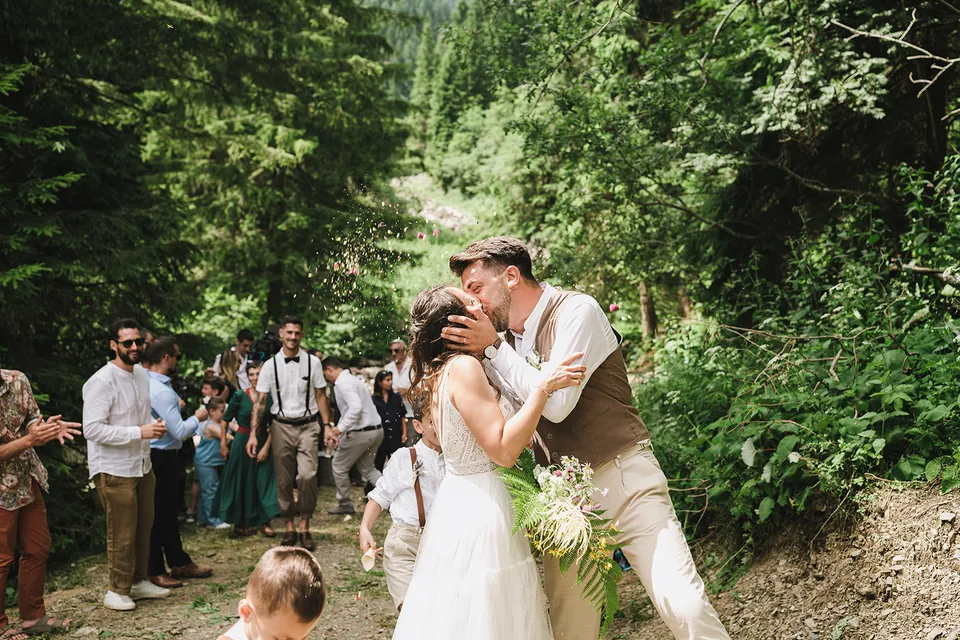 The first kiss, surrounded by the forest.