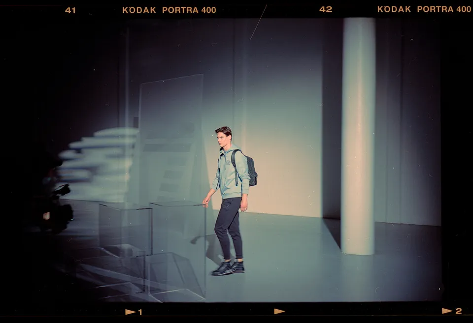 Armani — framed by light and shadow, on film