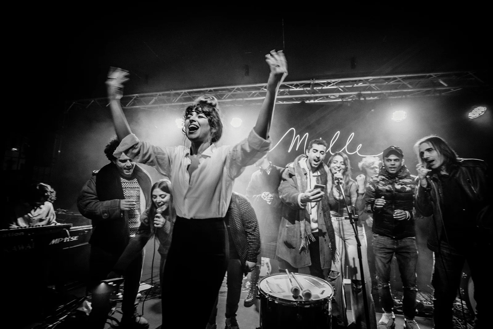 Mille live — the energy of the stage, in black and white