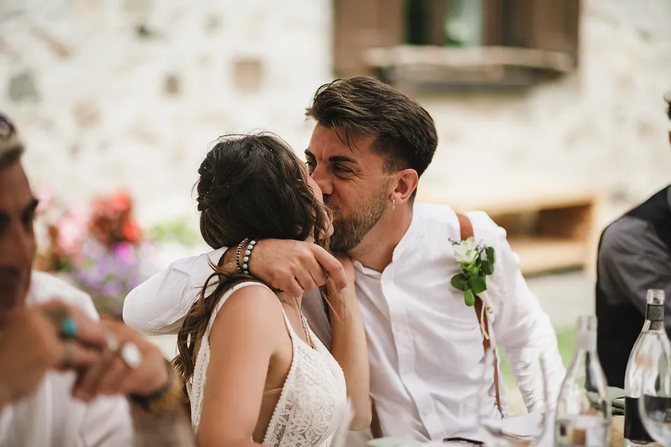 A kiss in the middle of the reception